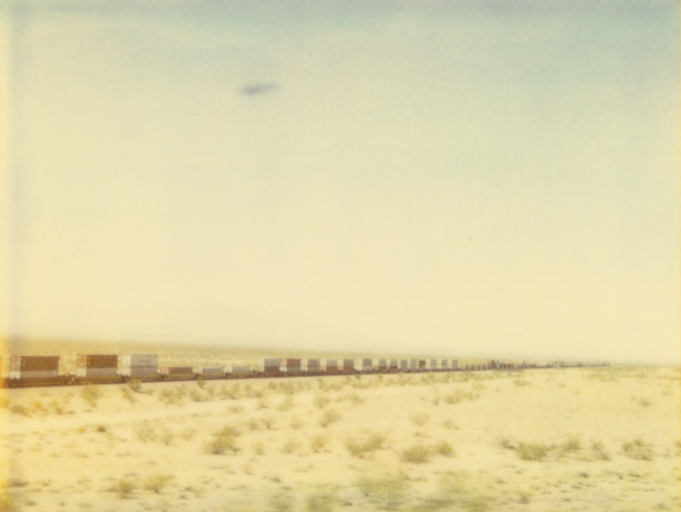 Train Crosses Plain